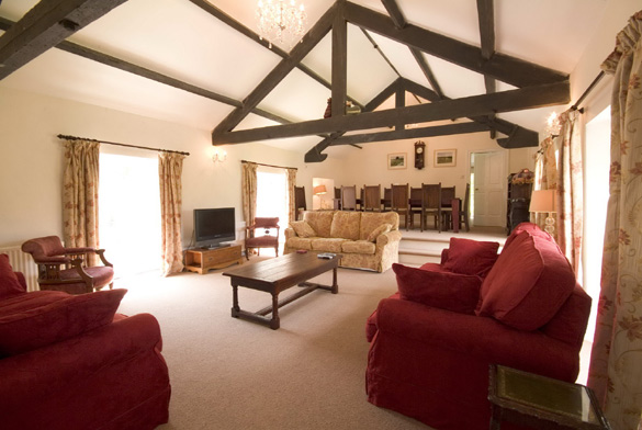 The main sitting room with dining area at Croft House (sleeps 12)
